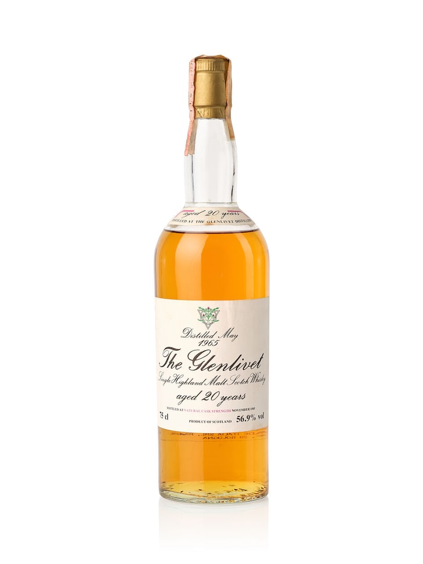 Glenlivet 20 Year Old Intertrade, 1965 (1x 750ml): Glenlivet 20 Year Old Intertrade, 1965 (1x 750ml) Region: Speyside Fill Level: mid shoulder Label: slightly stained label and neck label Alcohol content: 56.9% ABV Notes: bottled November 1985. Import