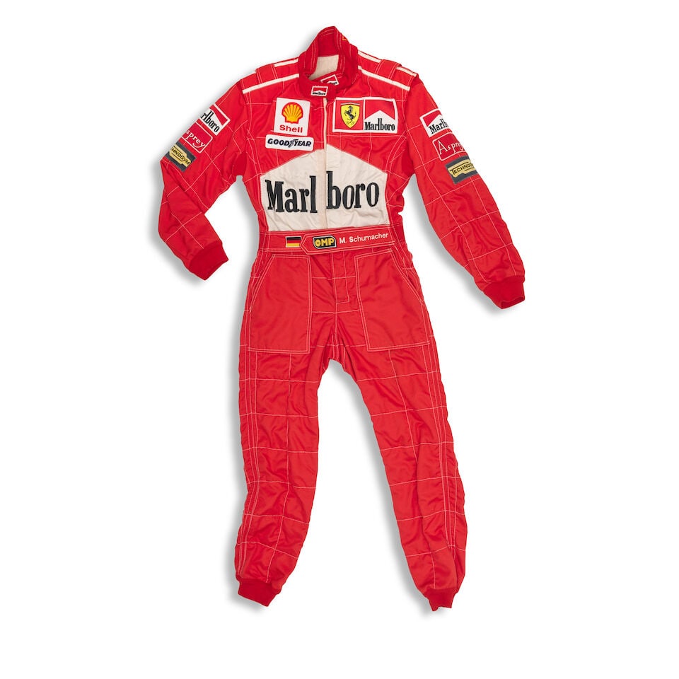 Michael Schumacher's Scuderia Ferrari 1997 Australian Grand Prix overalls,: Michael Schumacher's Scuderia Ferrari 1997 Australian Grand Prix overalls, in red and white, with sponsors logos, Australia written to reverse of belt, Schumacher qualified third for the grand prix