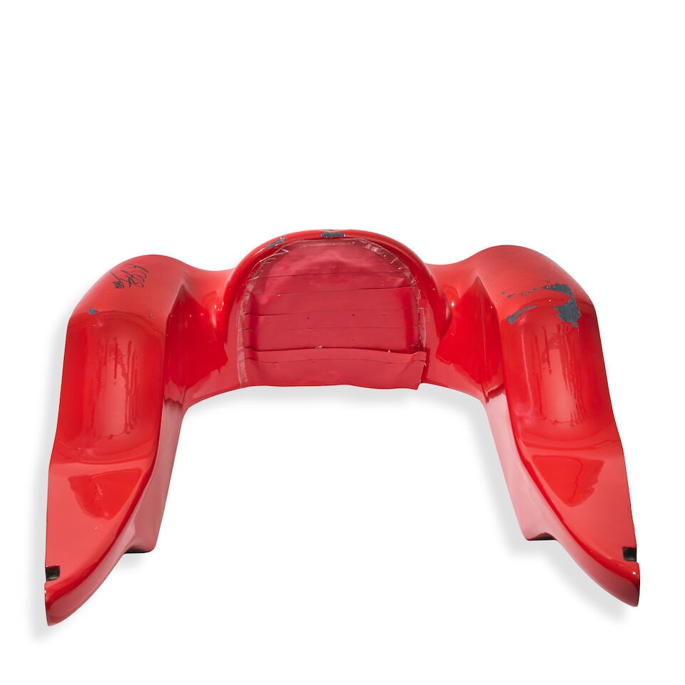 A Scuderia Ferrari F2004 F1 headrest signed by Michael Schumacher, - 2