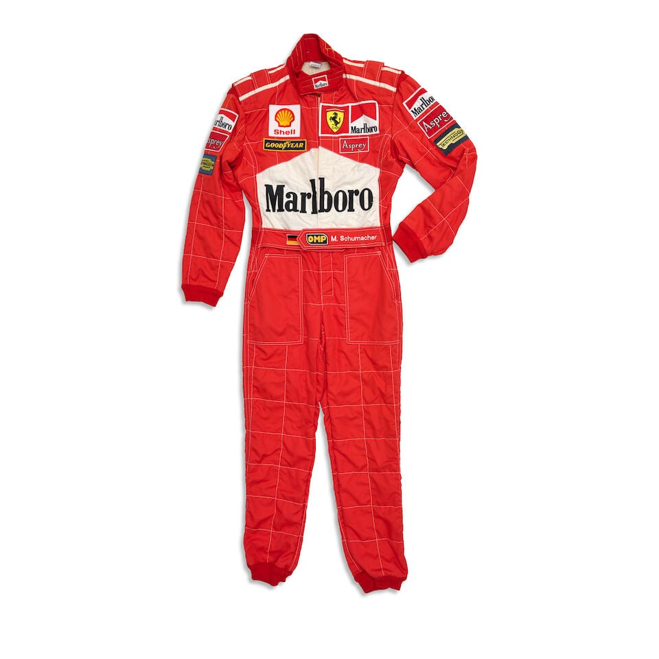 Michael Schumacher's Scuderia Ferrari 1998 San Marino Grand Prix overalls,: Michael Schumacher's Scuderia Ferrari 1998 San Marino Grand Prix overalls, in red and white, with sponsors logos, San Marino written to reverse of belt, Schumacher qualified third for the grand prix