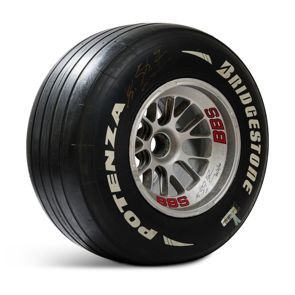 A used Ferrari Formula 1 wheel signed by Michael Schumacher, by BBS, - 4