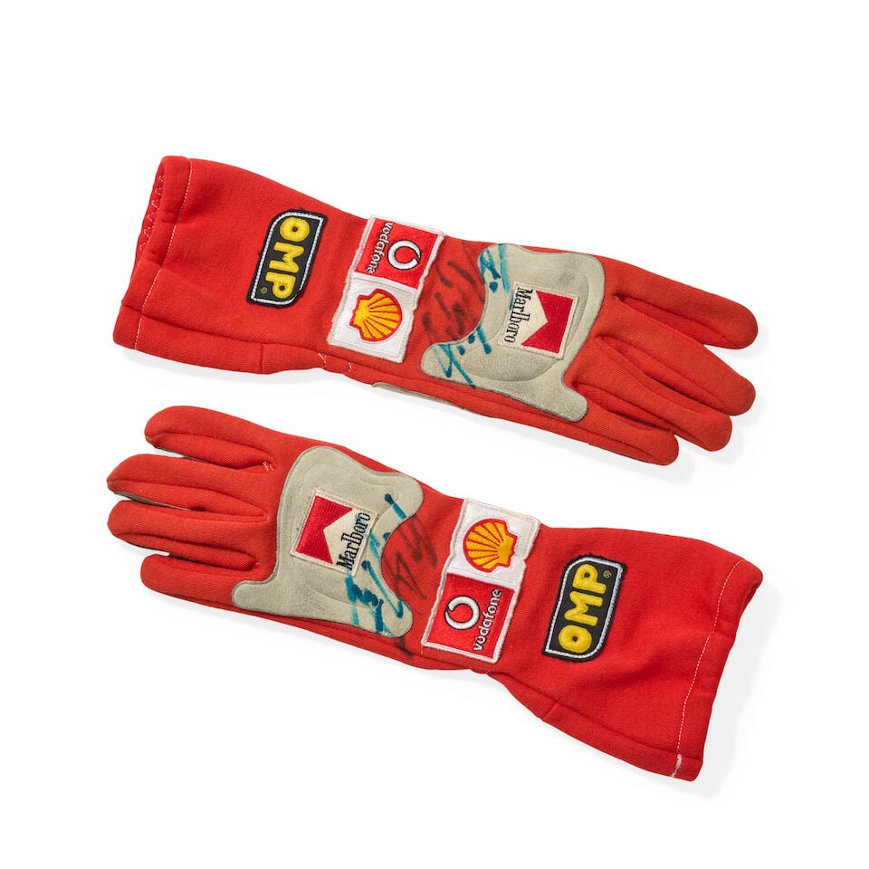 A signed pair of Michael Schumacher's 2004 Scuderia Ferrari used gloves, - 3