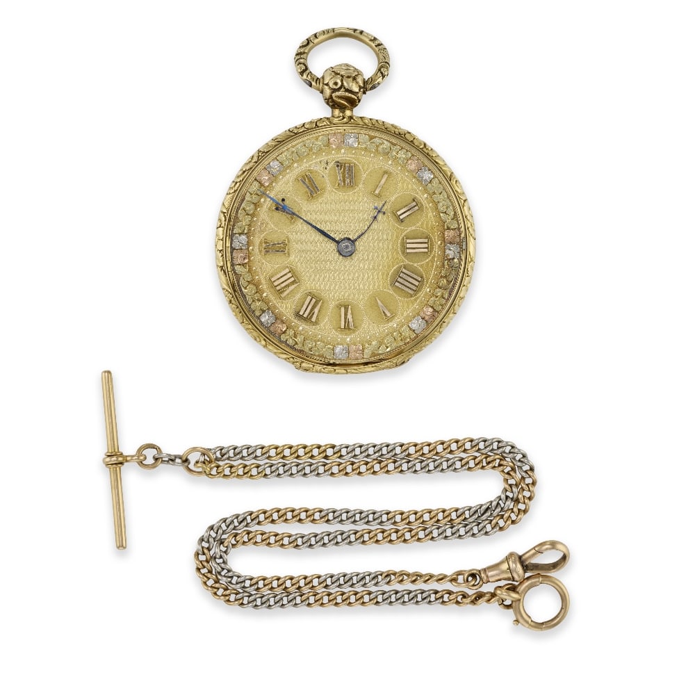 An 18K gold key wind open face pocket watch with 18K gold and platinum chain Chester Hallmark fo...: An 18K gold key wind open face pocket watch with 18K gold and platinum chain Date: Chester Hallmark for 1885 Movement: Gilt full plate English lever, plain three arm balance, diamond end stone, No.182