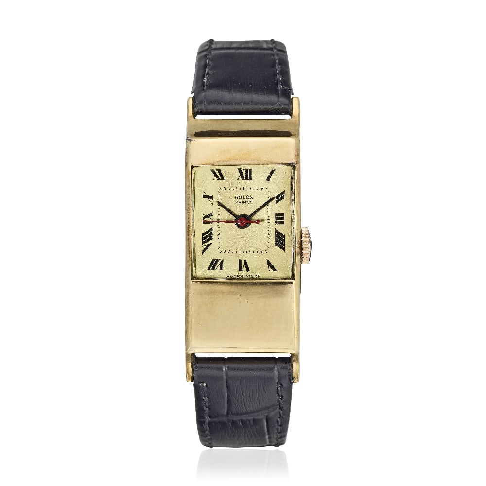 Rolex. A 9K gold manual wind drivers watch Prince Aerodynamic, Ref: 3361, Circa 1940: Rolex. A 9K gold manual wind drivers watch Model: Prince Aerodynamic Reference: 3361 Date: Circa 1940 Movement: 17-jewel manual wind Dial: Cream, black Roman numeral hour markers, black inner minute d