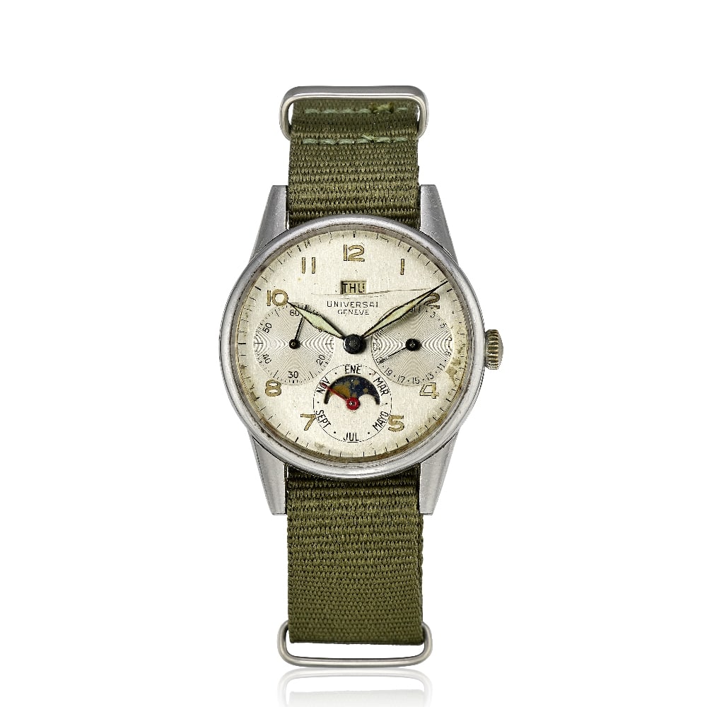 Universal Genève. A stainless steel manual wind triple calendar wristwatch with moon phase ...: Universal Genève. A stainless steel manual wind triple calendar wristwatch with moon phase Reference: 21308 Date: Circa 1950 Movement: Jewelled manual wind Dial: Silvered, gilt Arabic numeral hou