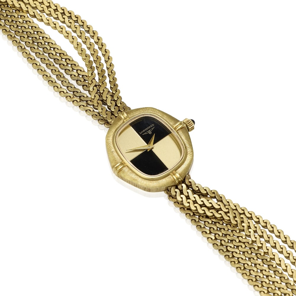 Longines. A lady's 18K gold manual wind bracelet watch with onyx dial Circa 1977: Longines. A lady's 18K gold manual wind bracelet watch with onyx dial Date: Circa 1977 Movement: 17-jewel Cal.L.817.4 manual wind, No.54365000 Dial: Sectored onyx and champagne, gilt sword hands Case:
