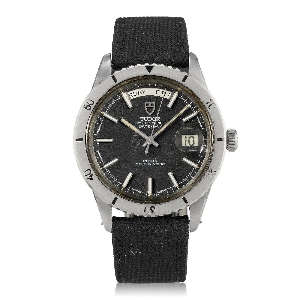 Tudor. A stainless steel automatic calendar wristwatch Oyster Prince Date + Day, Ref: 7020/0, C...: Tudor. A stainless steel automatic calendar wristwatch Model: Oyster Prince Date + Day Reference: 7020/0 Date: Circa 1969 Movement: 17-jewel A.Schild Cal.1895 automatic Dial: Black, polished baton hou