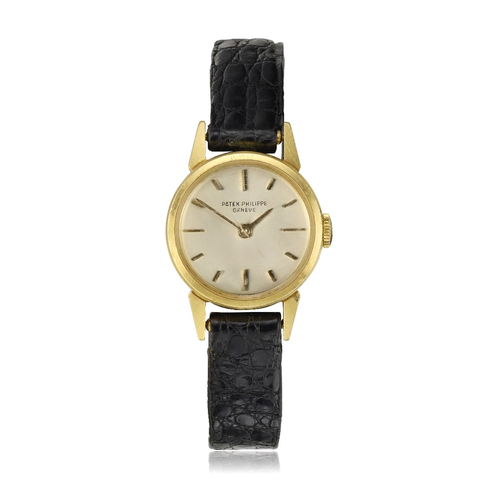Patek Philippe. A lady's 18K gold manual wind wristwatch Ref: 3260, Circa 1963: Patek Philippe. A lady's 18K gold manual wind wristwatch Reference: 3260 Date: Circa 1963 Movement: 18-jewel Cal.8-85 manual wind, No.857958 Dial: Silvered, applied gilt baton hour markers, gilt point