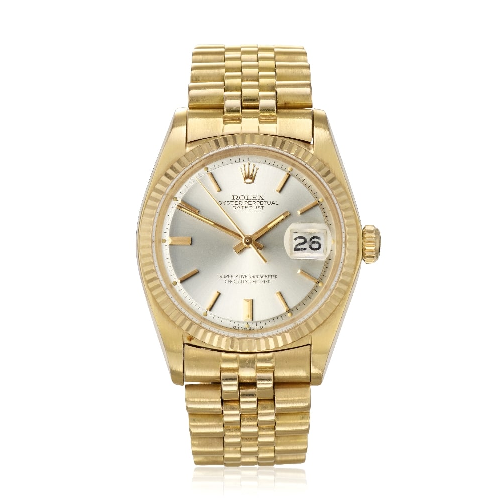 Rolex. An 18K rose gold automatic calendar bracelet watch with sigma dial Datejust, Ref: 1601, ...: Rolex. An 18K rose gold automatic calendar bracelet watch with sigma dial Model: Datejust Reference: 1601 Date: Circa 1976 Movement: 26-jewel Cal.1570 automatic, adjusted to 5 positions & temperature,