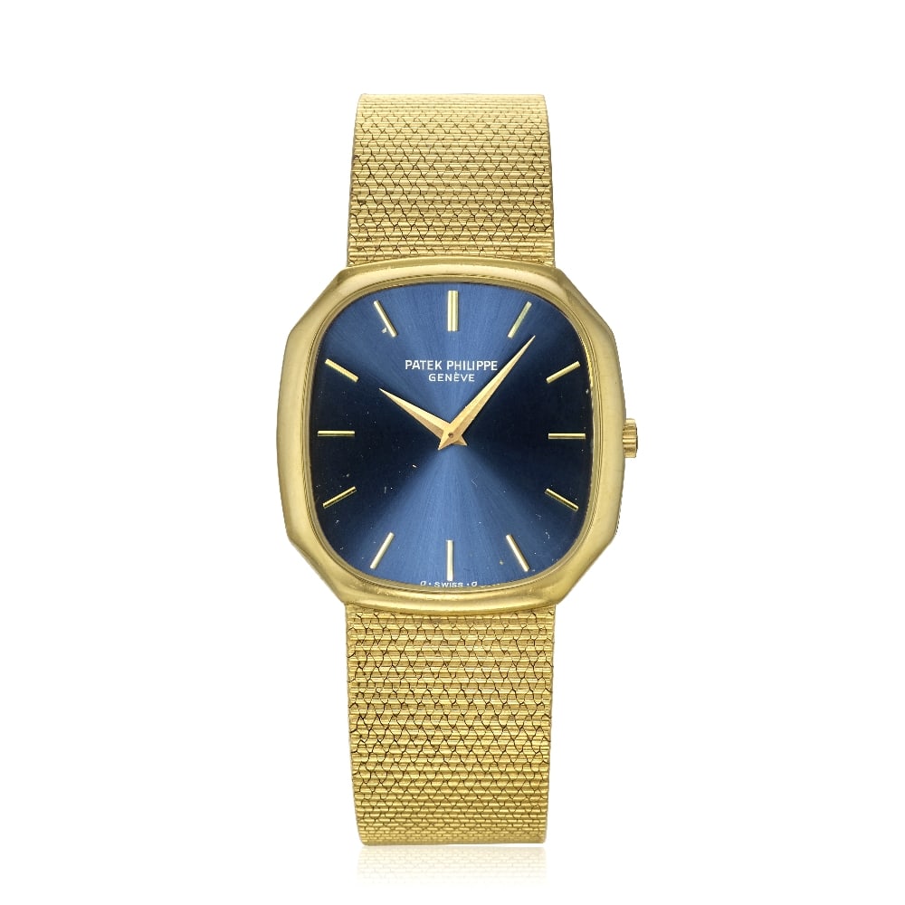 Patek Philippe. An 18K gold manual wind bracelet watch with sigma dial Golden Ellipse, Ref: 385...: Patek Philippe. An 18K gold manual wind bracelet watch with sigma dial Model: Golden Ellipse Reference: 3855/1 Date: Circa 1975 Movement: 18-jewel Cal.215 manual wind, adjusted to heat, cold, isochron