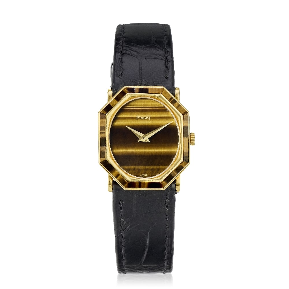 Piaget. An 18K gold manual wind wristwatch with Tiger's Eye dial and bezel Ref: 9341, Circa 1975: Piaget. An 18K gold manual wind wristwatch with Tiger's Eye dial and bezel Reference: 9341 Date: Circa 1975 Movement: 18-jewel Cal.9P1 manual wind, No.7400810 Dial: Tiger's eye, gilt lance hands Case: