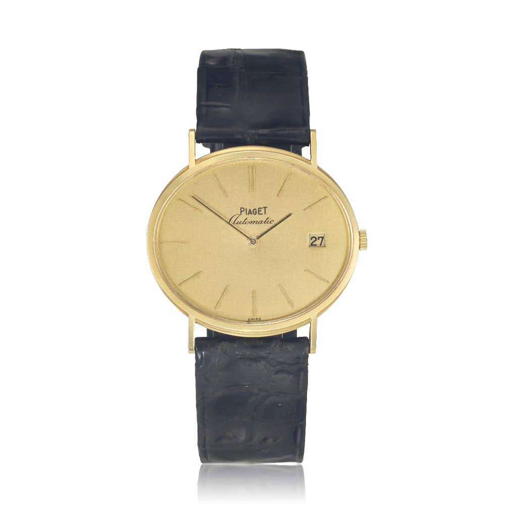 Piaget. An 18K gold automatic wristwatch Ref: 13501, Circa 1980: Piaget. An 18K gold automatic wristwatch Reference: 13501 Date: Circa 1980 Movement: 30-jewel Cal.12PC1 automatic, 24K gold micro-rotor, No.726608 Dial: Champagne, applied gilt baton hour markers, dat
