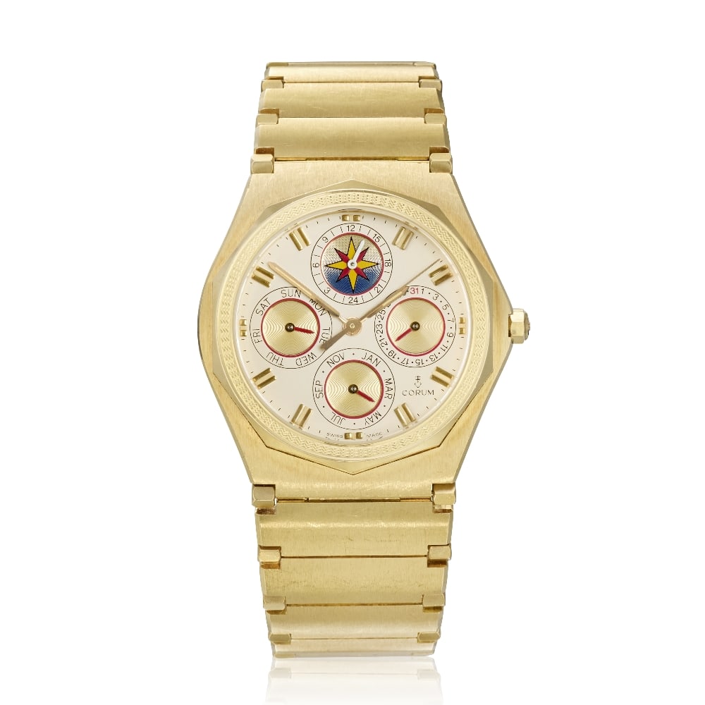 Corum. An 18K gold quartz triple calendar bracelet watch with 24 hour indication Admiral Quattr...: Corum. An 18K gold quartz triple calendar bracelet watch with 24 hour indication Model: Admiral Quattro Reference: 92.115.56 V-200 Date: Circa 1995 Movement: 7-jewel quartz, No.267265 Dial: Silvered, 