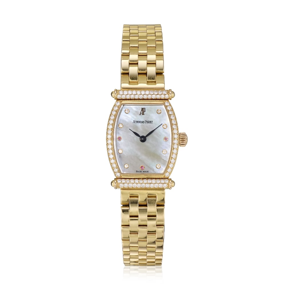 Audemars Piguet. A lady's 18K rose gold diamond set manual wind bracelet watch with mother of pe...: Audemars Piguet. A lady's 18K rose gold diamond set manual wind bracelet watch with mother of pearl dial Model: Carnegie Reference: 79302OR.ZZ.1032OR.01 Date: Purchased 9th April 1997 Movement: 18-jew