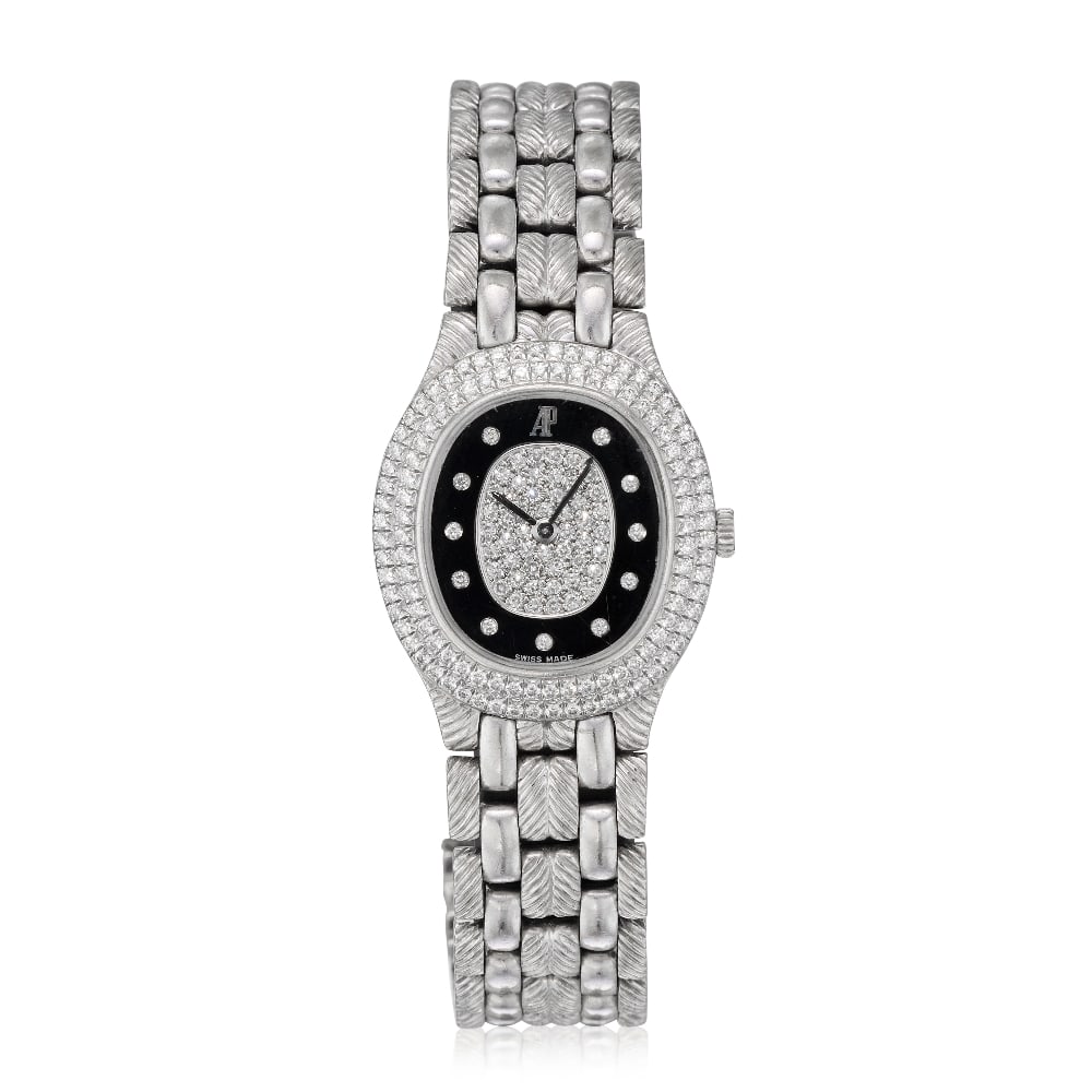 Audemars Piguet. A lady's 18K white gold diamond set quartz bracelet watch with onyx dial Circa ...: Audemars Piguet. A lady's 18K white gold diamond set quartz bracelet watch with onyx dial Date: Circa 1990 Movement: 7-jewel quartz, No.358736 Dial: Onyx with diamond set centre, diamond set hour mark