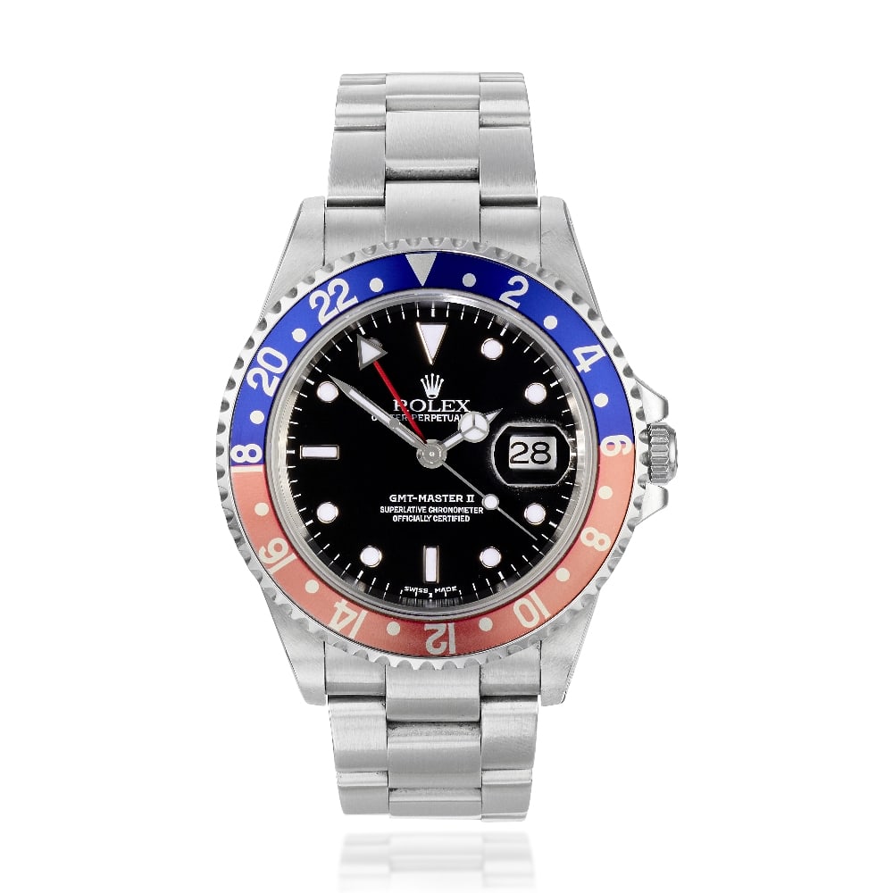 Rolex. A stainless steel automatic calendar bracelet watch with dual time zone GMT-Master II 'P...: Rolex. A stainless steel automatic calendar bracelet watch with dual time zone Model: GMT-Master II 'Pepsi' Reference: 16710 Date: Purchased 21st February 2002 Movement: 31-jewel Cal.3185 automatic, N
