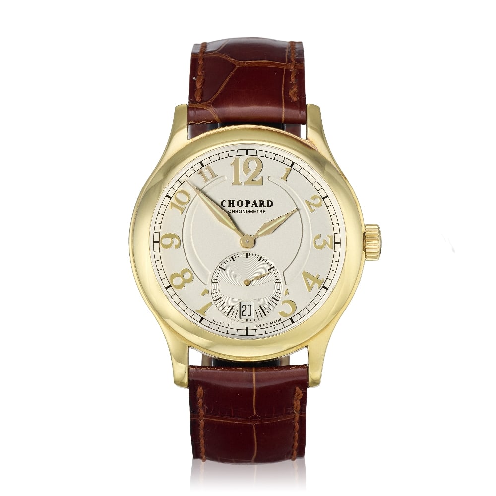 Chopard. An 18K gold automatic calendar wristwatch Ref: 1875, Circa 2008: Chopard. An 18K gold automatic calendar wristwatch Reference: 1875 Date: Circa 2008 Movement: 32-jewel Cal.3.96 automatic, 22K gold micro rotor, No.3003030 Dial: Silvered, applied gilt Arabic numeral 