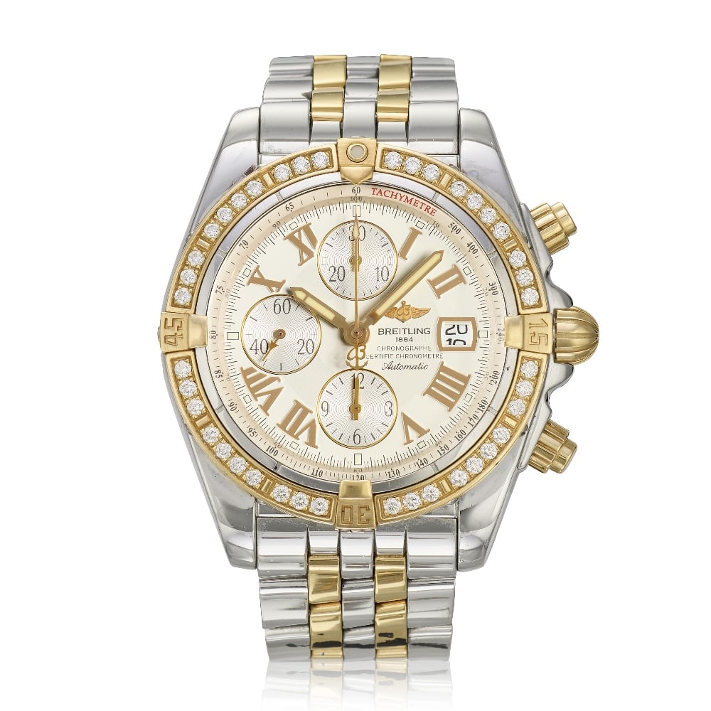 Breitling. A stainless steel and rose gold diamond set calendar chronograph bracelet watch with ...: Breitling. A stainless steel and rose gold diamond set calendar chronograph bracelet watch with mother of pearl dial Model: Chronomat Reference: C13356 Date: Circa 2005 Movement: Jewelled automatic Di