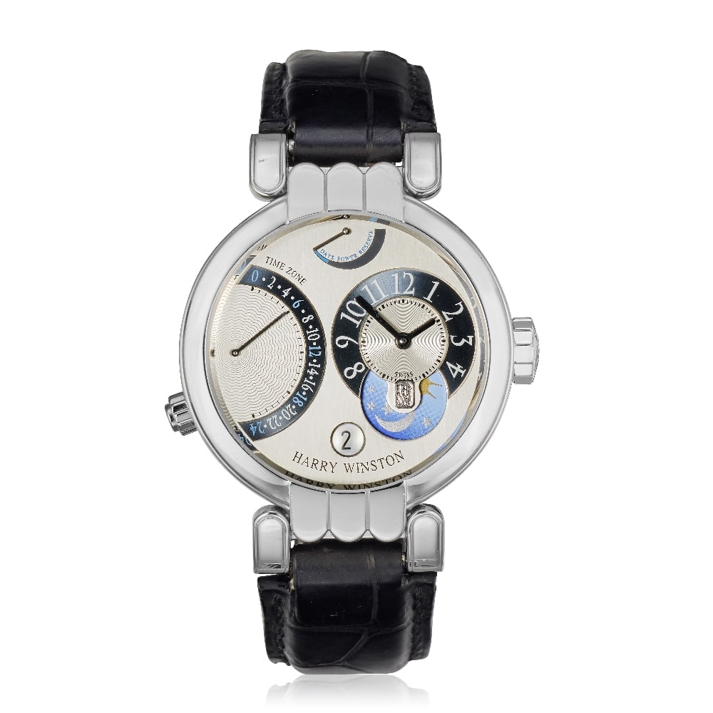 Harry Winston. An 18K white gold manual wind calendar wristwatch with 5-day power reserve, dual ...: Harry Winston. An 18K white gold manual wind calendar wristwatch with 5-day power reserve, dual time zone and day/night indication Model: Premier Excenter Timezone Reference: 200-MMTZ39W Date: Circa 2