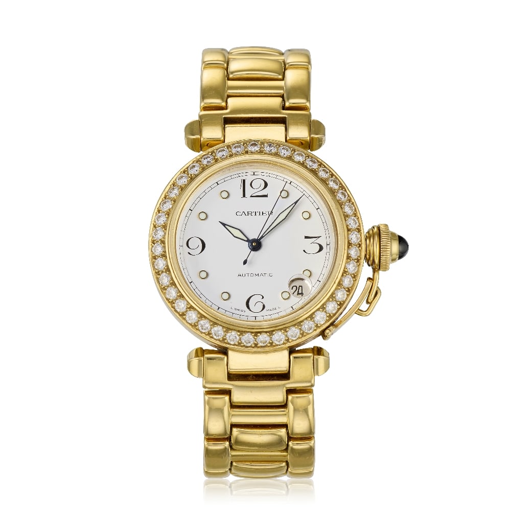 Cartier. An 18K gold diamond set automatic calendar bracelet watch Pasha, Ref: 1035, Circa 2010: Cartier. An 18K gold diamond set automatic calendar bracelet watch Model: Pasha Reference: 1035 Date: Circa 2010 Movement: 21-jewel Cal.049 automatic, No.288275 Dial: Silvered, Arabic numeral quarters