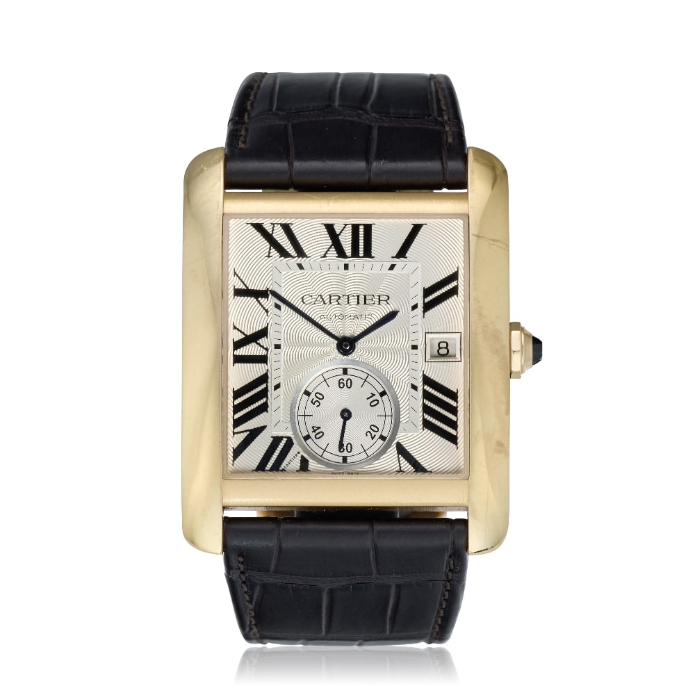 Cartier. An 18K rose gold automatic calendar wristwatch Tank MC, Ref: 3590, Circa 2015: Cartier. An 18K rose gold automatic calendar wristwatch Model: Tank MC Reference: 3590 Date: Circa 2015 Movement: 27-jewel Cal.1904-PS MC automatic Dial: Guilloché engraved silvered, black Roman 