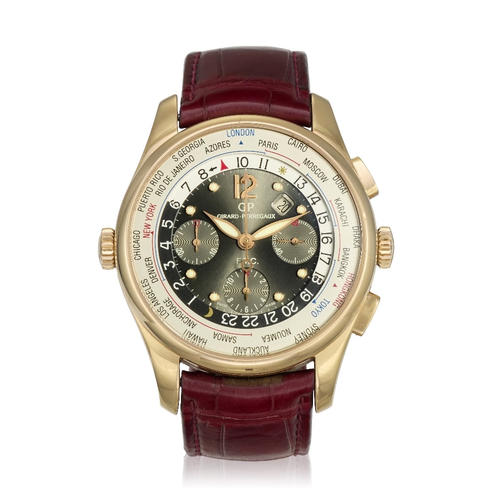 Girard-Perregaux. An 18K rose gold automatic calendar chronograph wristwatch with world time ind...: Girard-Perregaux. An 18K rose gold automatic calendar chronograph wristwatch with world time indication Model: WW.TC Financial Reference: 49805 Date: Circa 2010 Movement: 63-jewel Cal.3387 automatic, 