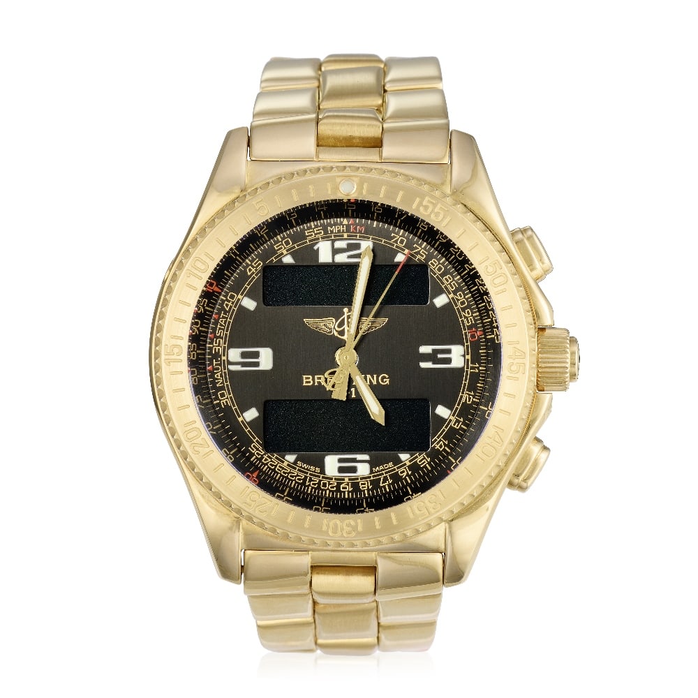 Breitling. An 18K gold quartz calendar chronograph bracelet watch with digital display B-1, Ref... (1 of 1)