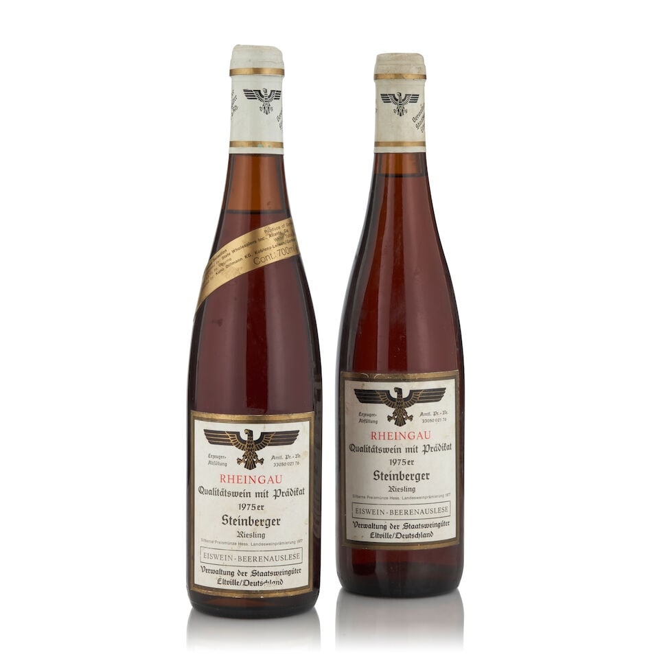 Staatsweinguter Eltville, Steinberger Beerenauslese Eiswein, 1975 (2 bottles, 750ml): Staatsweinguter Eltville, Steinberger Beerenauslese Eiswein, 1975 (2 bottles, 750ml) Region: Germany Fill Level: one 1.5cm, one 3cm Capsule: stained and worn Label: lightly bin soiled This lot is