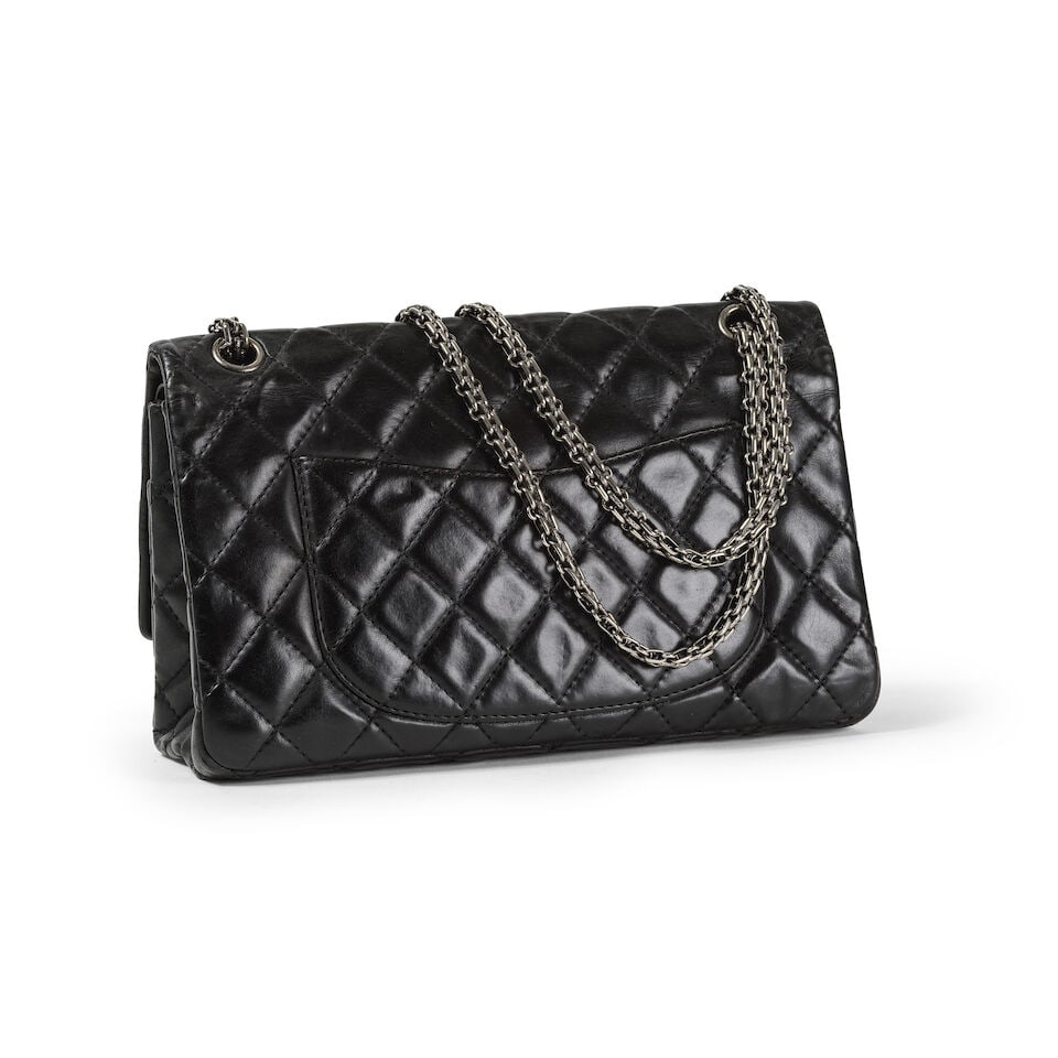 Chanel, année 2005. Sac 2.55 en toile enduite matelassée noire. Chanel, year 2005. 2.5... - 2