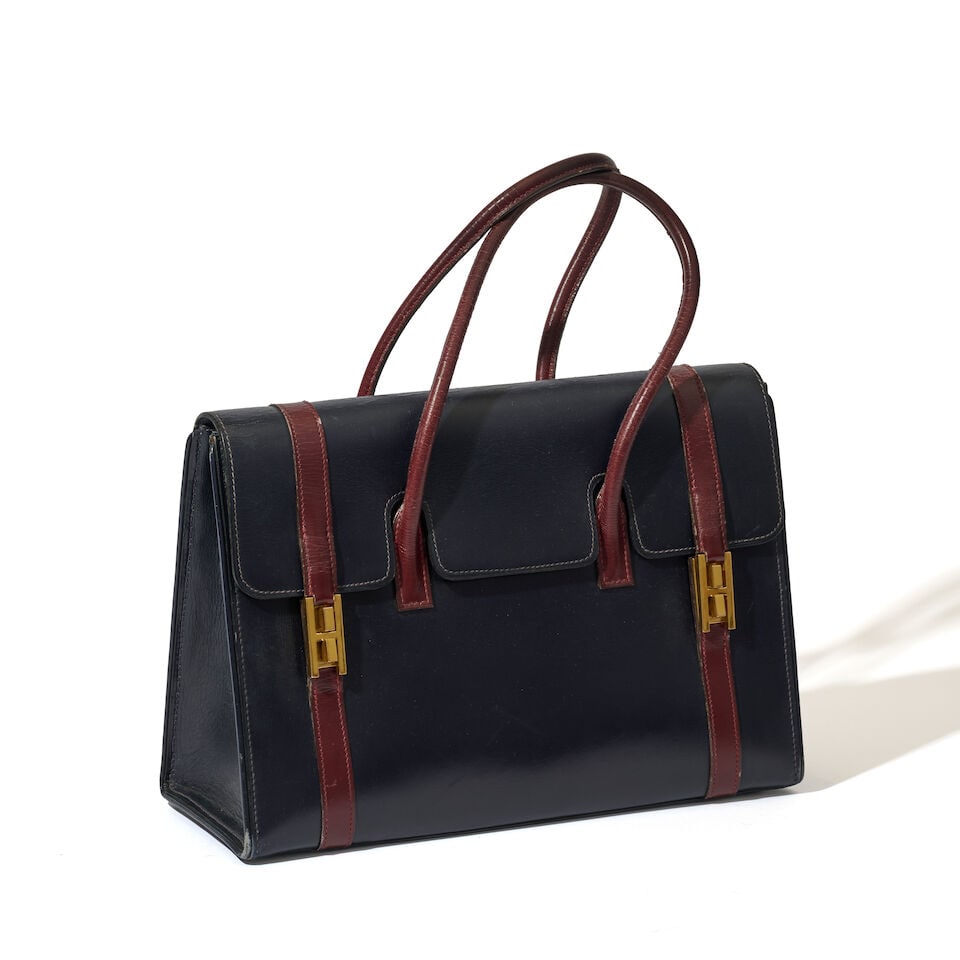 Hermès Paris, années 1980. Sac Drag en box marine et bordeaux. Hermès Paris, 1980... (1 of 2)