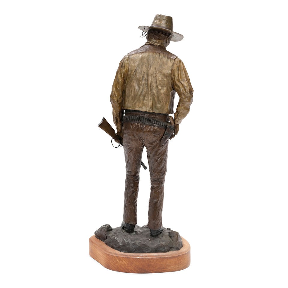 DAVID MANUEL (1940) John Wayne 'American' 27 3/4 in. high, on a 2 1/4 in. high wood base - 2