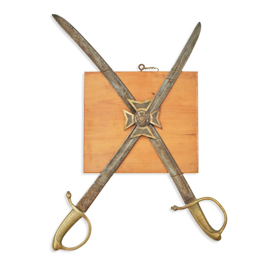 Two Russian 1817 Model Infantry Russian briquet hangers: Two Russian 1817 Model Infantry Russian briquet hangers 19th century Each with slightly curved fullered blade, brass hilt with knuckle guard, plain back-piece and shaped quillon; together with a