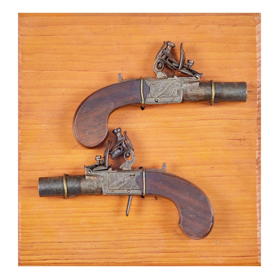 A pair of flintlock box-lock pocket pistols (2): A pair of flintlock box-lock pocket pistols Signed Johnson & Collins, circa 1815-20 With turn-off barrels, signed actions engraved with a martial trophy on each side, sliding safety-catches also