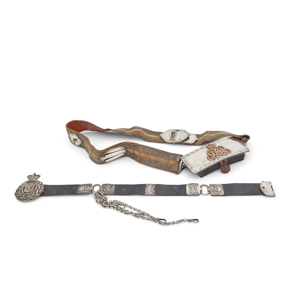 An Officer's silver and ormolu mounted cross belt and pouch (qty): An Officer's silver and ormolu mounted cross belt and pouch Maker's marks of Joseph Angel, John & William Frost and W.T, London hallmarks for 1812 The foliate engraved flap pouch with applied 'GR'