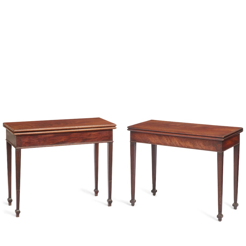 A near pair of George III mahogany card and tea tables Early 19th century (2): A near pair of George III mahogany card and tea tables Early 19th century With hinged rectangular tops, one plain, the other with a green baize playing surface, the games table with frieze drawer rais