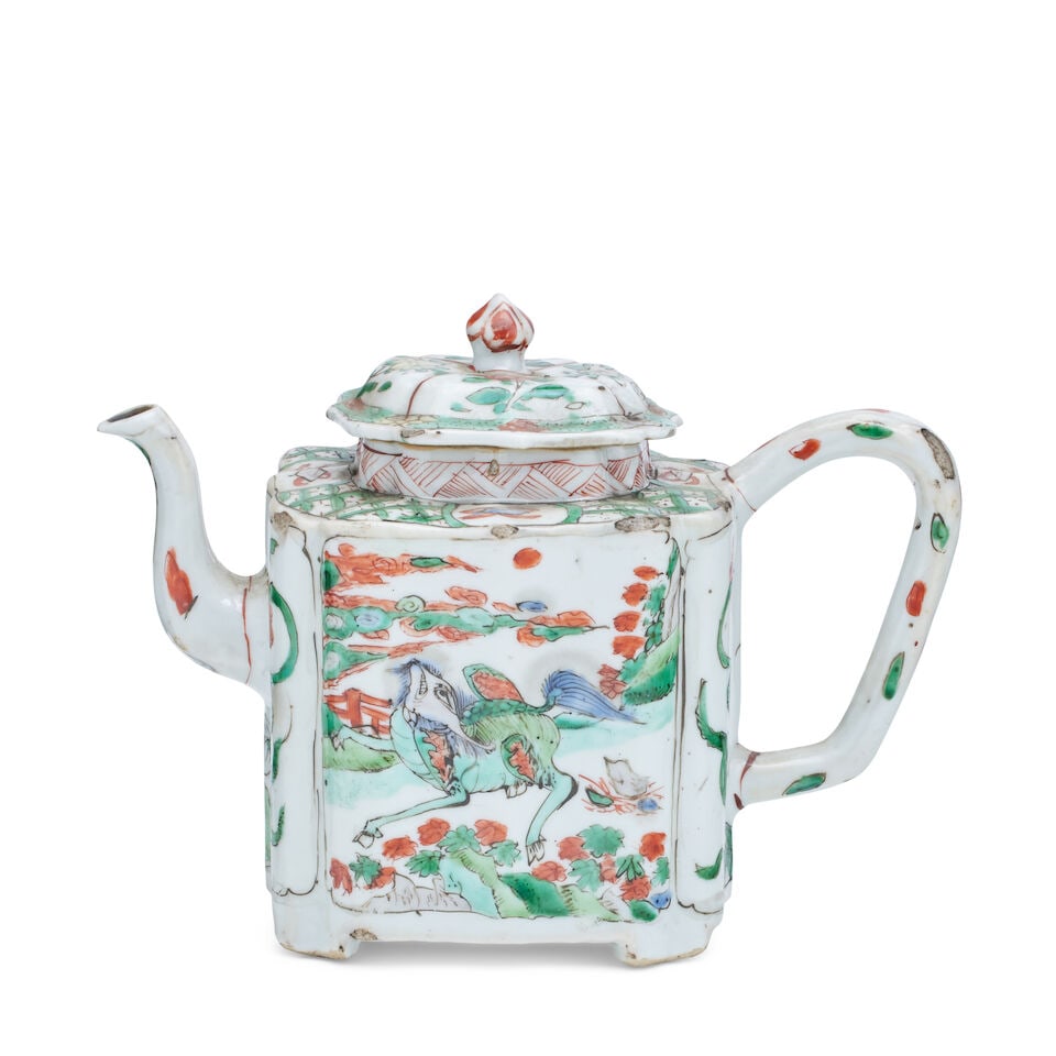 A famille verte teapot Kangxi: A famille verte teapot Kangxi Of rectangular form, decorated with qilin in panels, 12.5cm high. For further information on this lot please visit Bonhams.com For further information about this lot