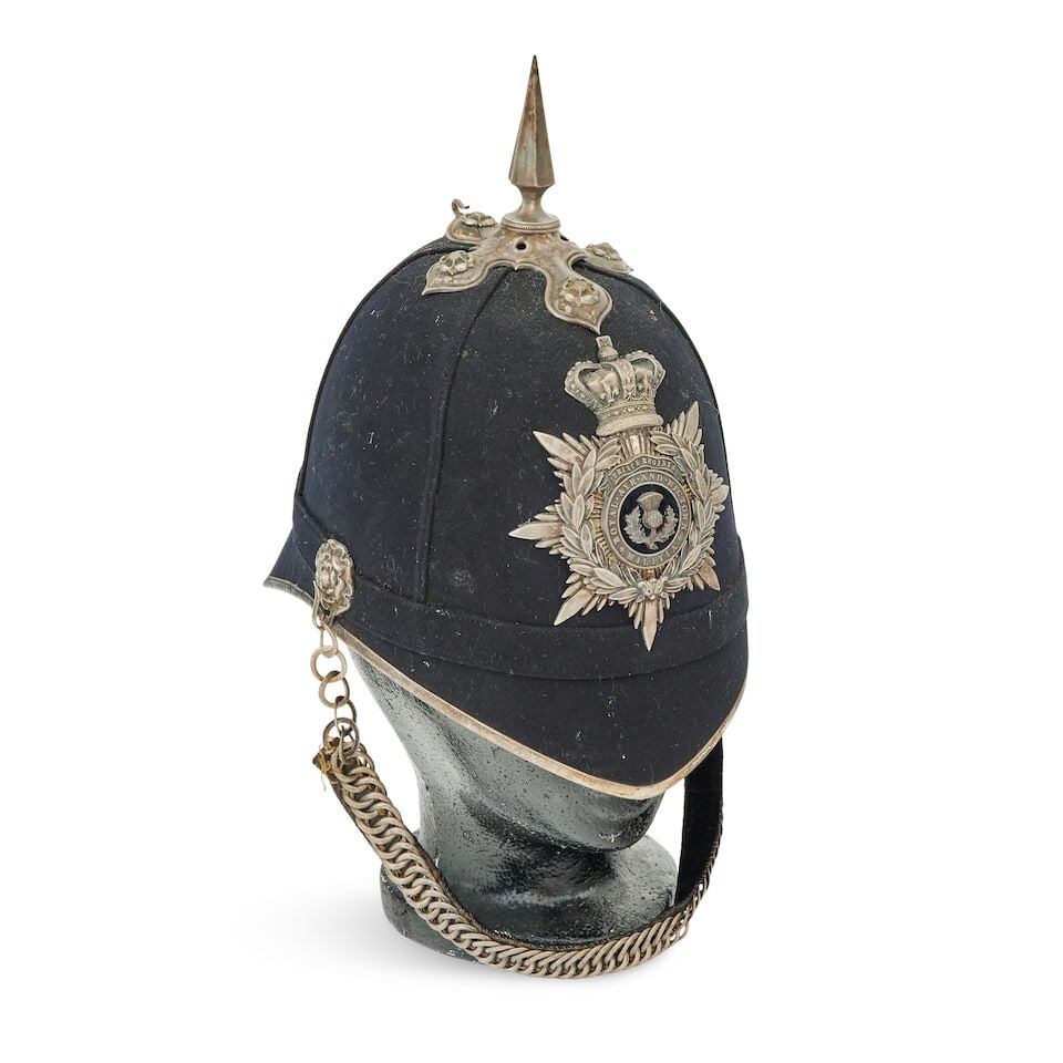 An Officer's Home Service blue cloth helmet of The Prince Regent's Royal Ayr & Wigtown Militia: An Officer's Home Service blue cloth helmet of The Prince Regent's Royal Ayr & Wigtown Militia With regimental helmet-plate, surmounted by a spike, and with lined chin-chain, the interior stamped