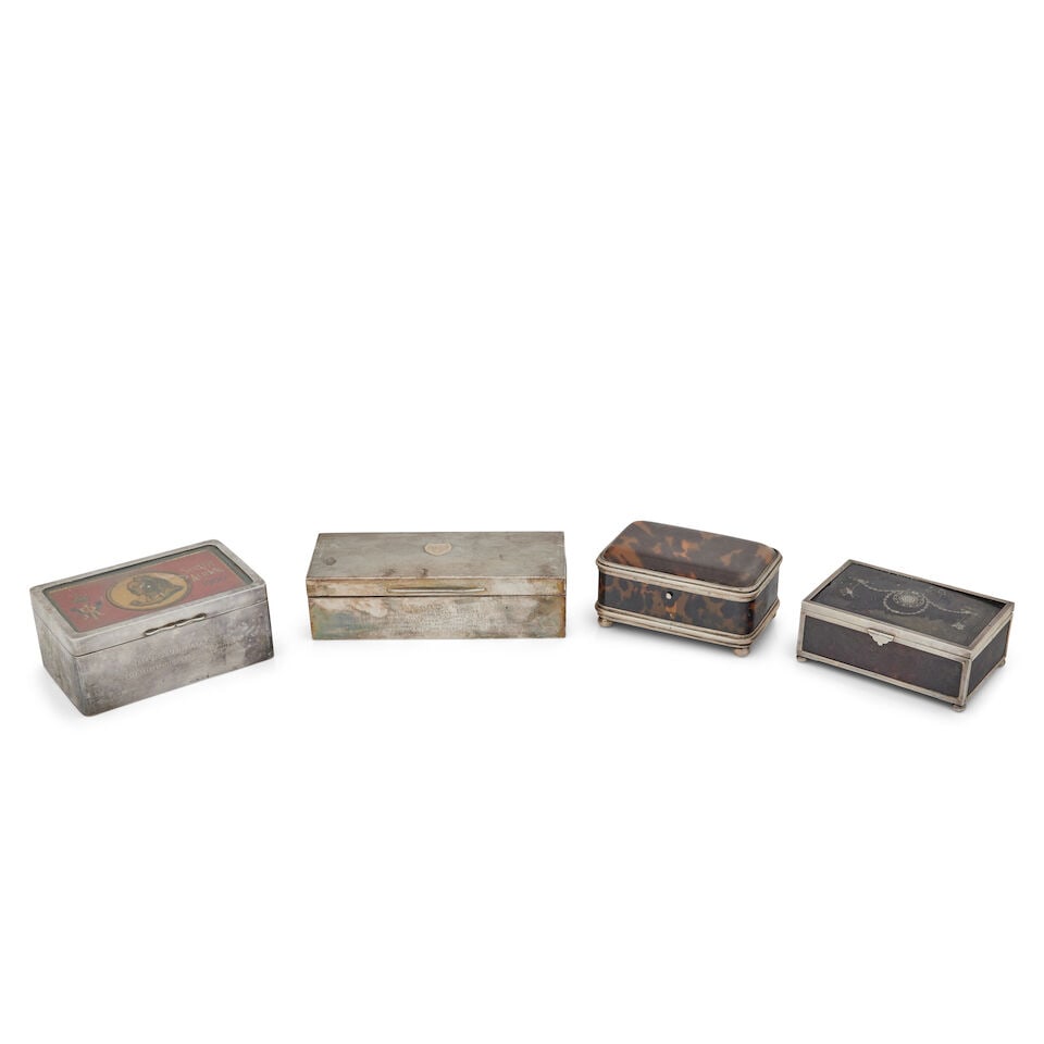 Two early 20th century silver cigarette boxes Various makers and dates (4): Two early 20th century silver cigarette boxes Various makers and dates The first with glazed lid enclosing the lid of a Boer war presentation tin, inscribed 'Lieut Aymer Maxwell, 5th Battalion