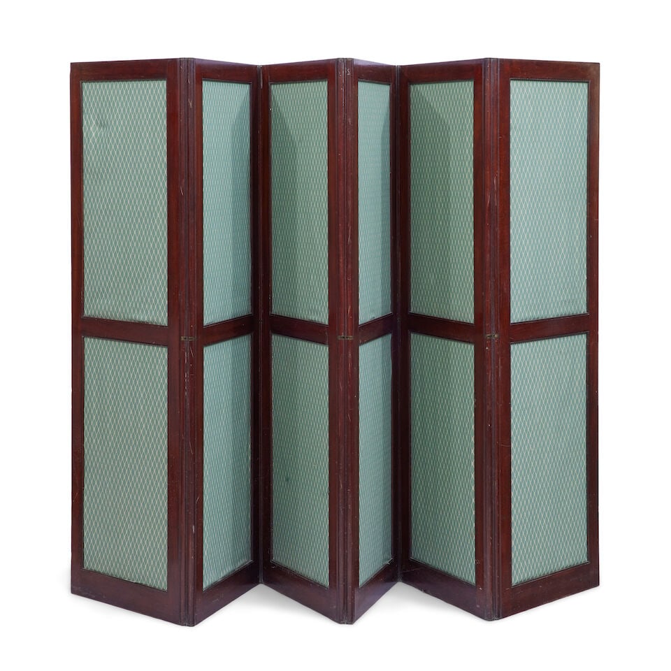 A large mahogany framed six panel folding screen 19th century: A large mahogany framed six panel folding screen 19th century Each mounted with two rectangular sections of green lattice covered cloth, 366cm wide x 2cm deep x 184cm high, (144in wide x 1/2in deep x