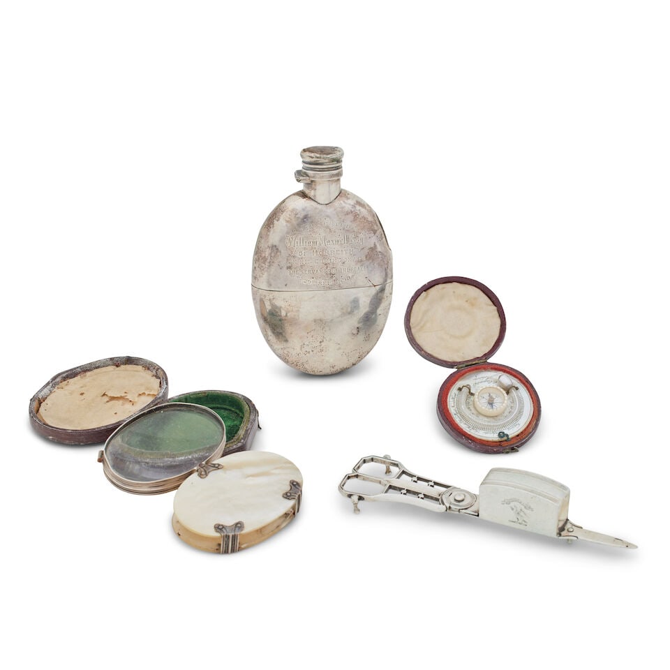 A Victorian silver spirit flask By Samson Mordan, London 1887 (4): A Victorian silver spirit flask By Samson Mordan, London 1887 Oval with detachable cup, inscribed 'Presented to William Maxwell esq. of Monreith on his coming of age, by the servants of the place 20