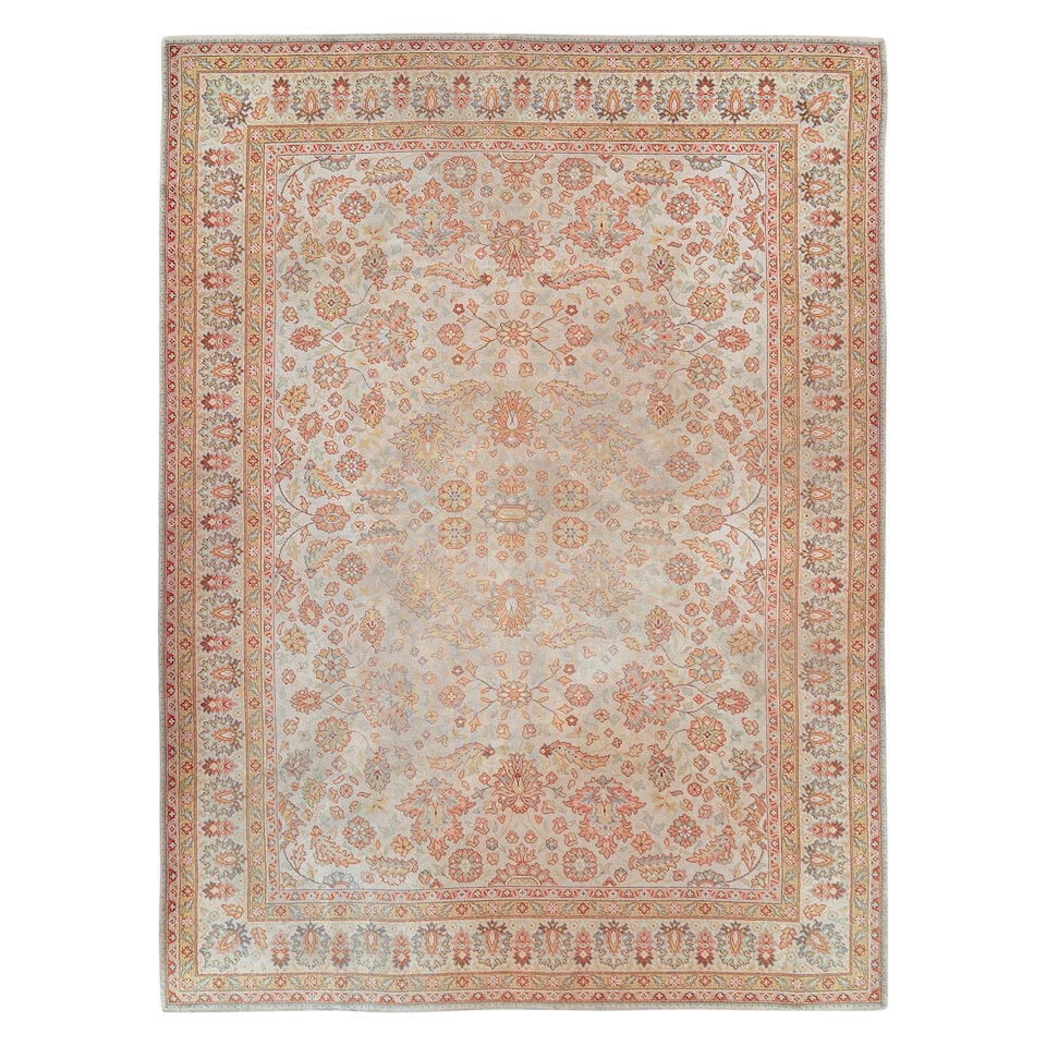 A Zeigler style machine made carpet English, early 20th century 273cm x 364cm: A Zeigler style machine made carpet English, early 20th century With typical allover Shah Abbas palmettes and entwined foliage on an ivory ground, within a wide palmette border 273cm x 364cm This lot