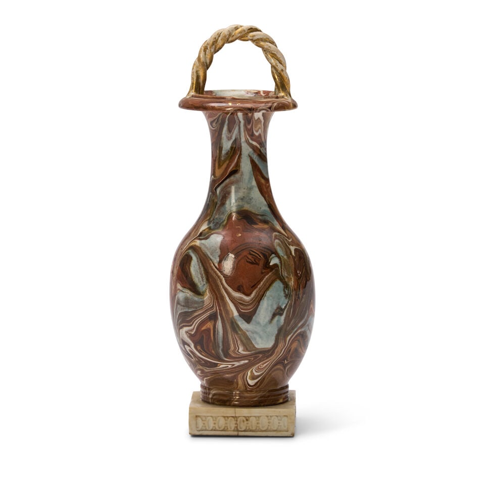 Wedgwood & Bentley Surface Agate Vase, England c. 1770,: Wedgwood & Bentley Surface Agate Vase, England c. 1770, bottle shape with overhead coiled handle, set on a white jasper plinth, impressed mark, ht. 7 1/4 in. For further information on this lot please