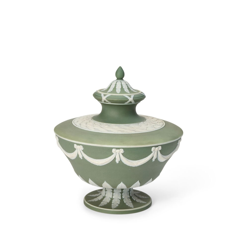 Wedgwood Green Jasper Dip Vase and Cover, England, 19th century,: Wedgwood Green Jasper Dip Vase and Cover, England, 19th century, of squat form with applied white drapery swags and foliate borders, impressed mark, ht. 8 1/4 in. Footnotes: Provenance Faith and Bruce