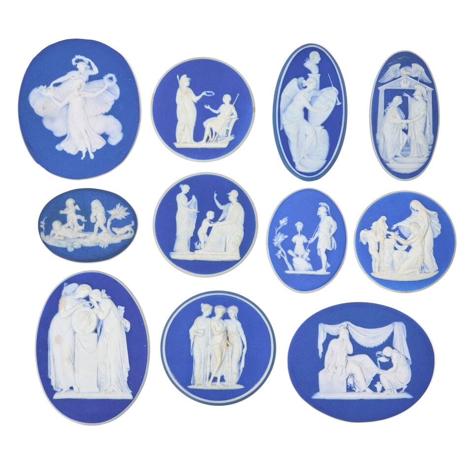 Eleven Wedgwood Dark Blue Jasper Medallions, England, 18th and 19th century,: Eleven Wedgwood Dark Blue Jasper Medallions, England, 18th and 19th century, each with applied white classical figures in relief, circular and ovals, impressed marks, lg. 2 to 3 1/8 in. Footnotes: Pro