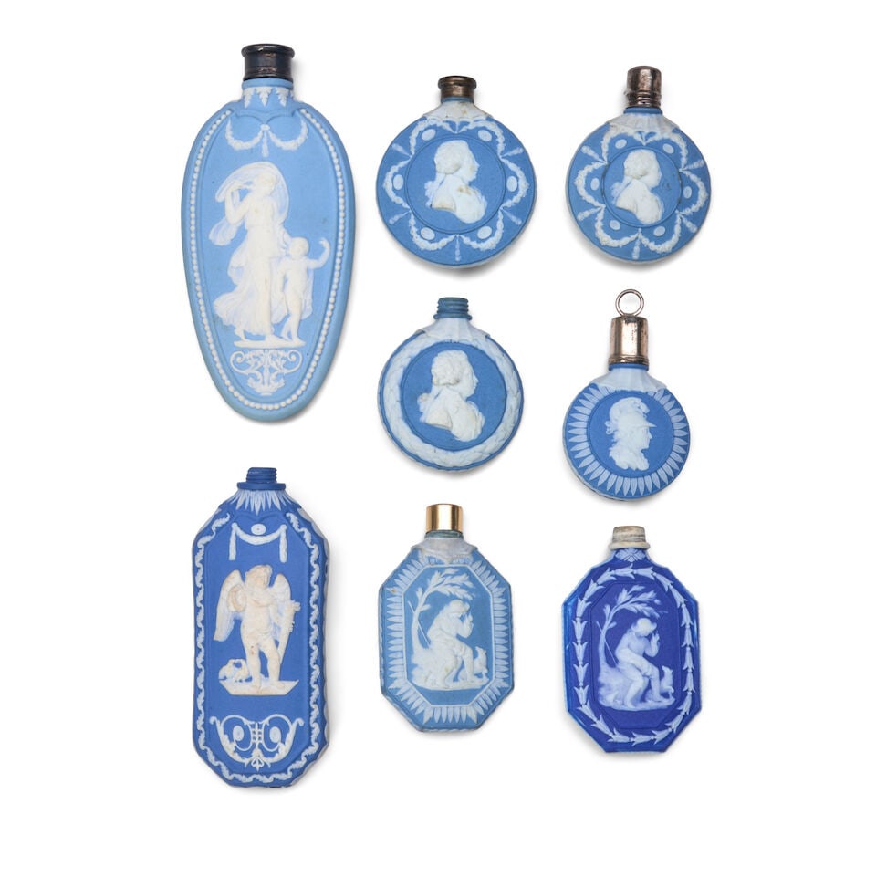 Collection of Eight Wedgwood Blue Jasper Perfumes, England, late 18th/19th century,: Collection of Eight Wedgwood Blue Jasper Perfumes, England, late 18th/19th century, each with applied white relief, a dark blue dip with classical figures, lg. 2 5/8; and seven solid blue, three with 
