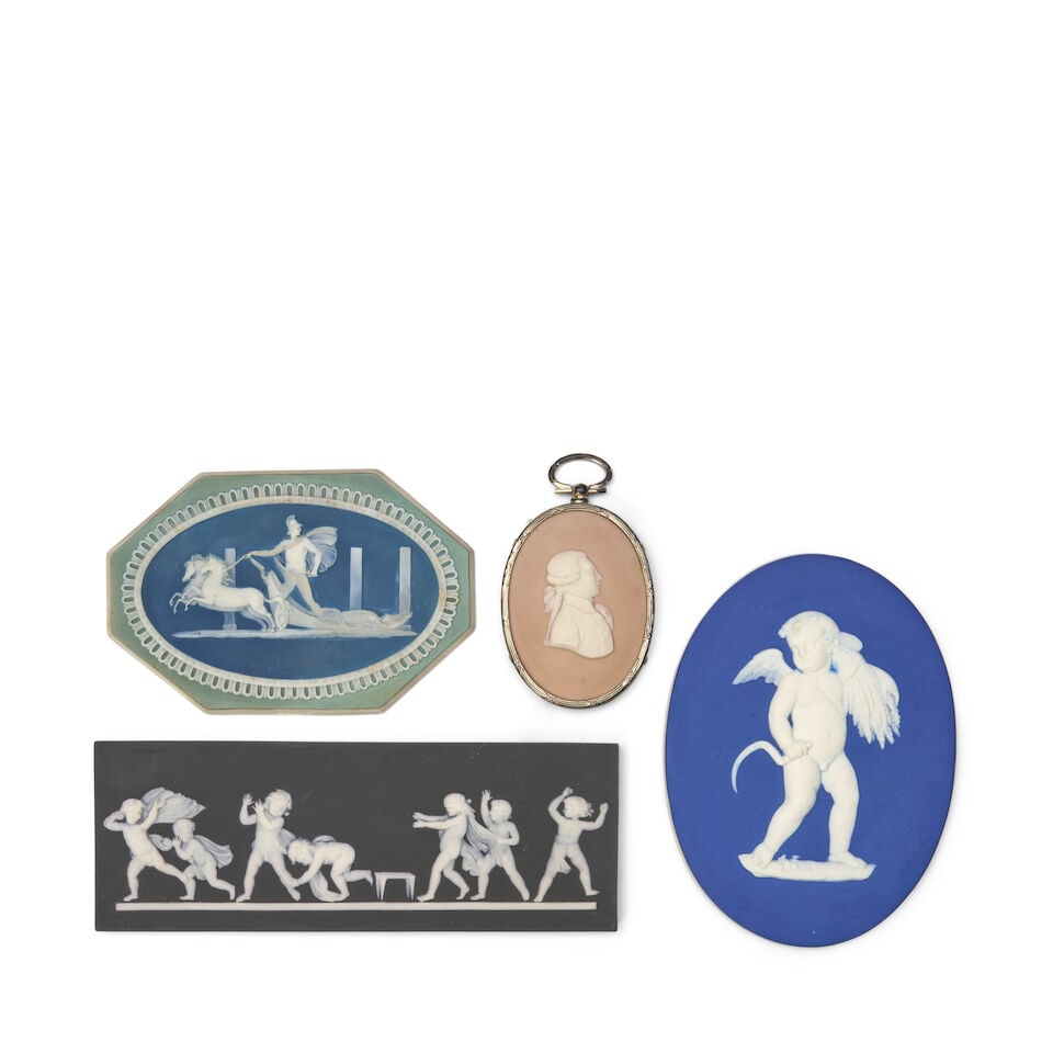 Four Wedgwood Jasper Plaques/Medallions, England, 19th and 20th century,: Four Wedgwood Jasper Plaques/Medallions, England, 19th and 20th century, each with applied white relief, an oval with a cupid as Autumn to a dark blue dip, lg. 5 1/4; a rectangular black dip with Blin