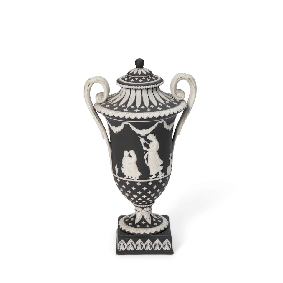 Wedgwood Diceware Jasper Dip Vase & Cover, England, 19th century,: Wedgwood Diceware Jasper Dip Vase & Cover, England, 19th century, black ground with applied white classical figures, scrolled handles, quatrefoils and foliate borders, impressed mark, ht. 9 in. Footno