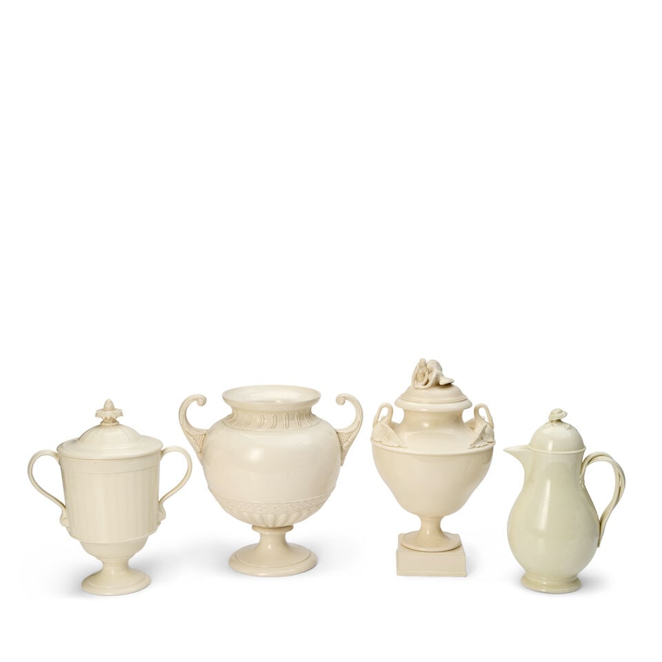 Four Wedgwood Queen's Ware Items, England, 19th and 20th centry,: Four Wedgwood Queen's Ware Items, England, 19th and 20th centry, two 19th century, a pear-shaped entwine handled jug and cover, flower finial, ht. 10 1/4; a scroll-handled bulbous vase, ht. 10 1/4; an