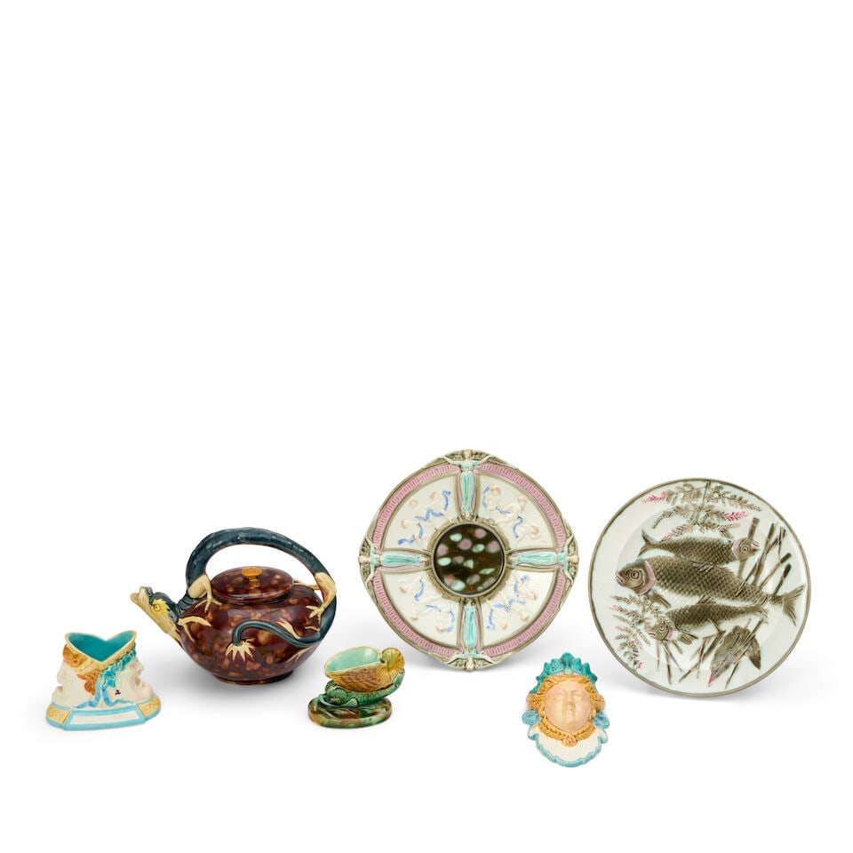 Six Wedgwood Majolica Items, England, second half 19th century,: Six Wedgwood Majolica Items, England, second half 19th century, each polychrome enamel decorated, a wall pocket match holder with face of a woman, lg. 5; a match holder with theatrical masks of a man 