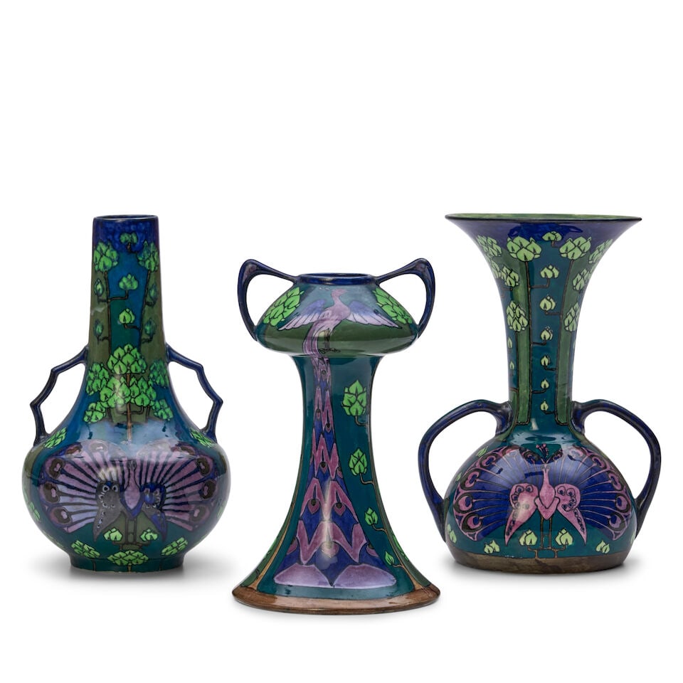 Three Wedgwood Lindsay Ware Peacock Vases, England, c. 1901,: Three Wedgwood Lindsay Ware Peacock Vases, England, c. 1901, polychrome decorated in the art nouveau style, each decorated with peacocks amongst foliage, varying shapes, each with two handles, printed